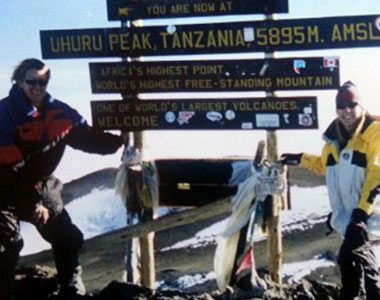 Carol and a friend at Uhuru Peak