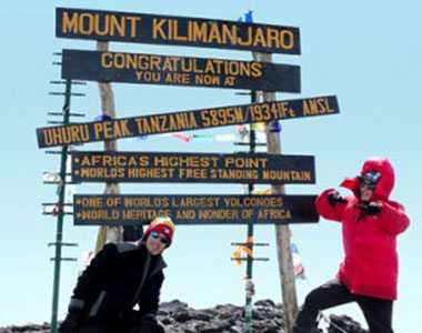 New summit sign at Uhuru Peak