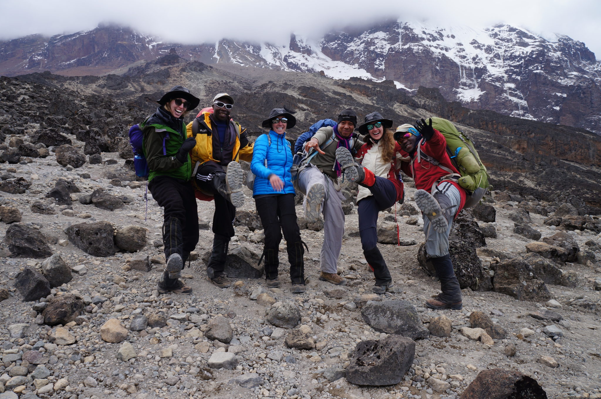 Natalie H. and her companions getting silly on Kili