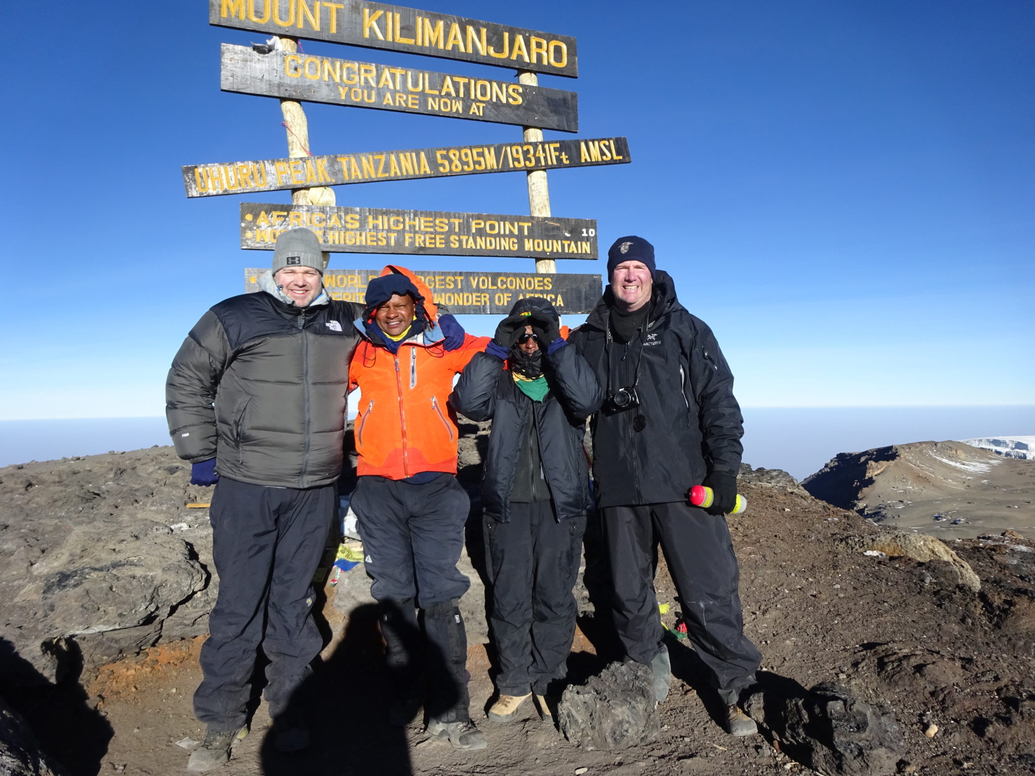 David C. with guides at Uhuru peak