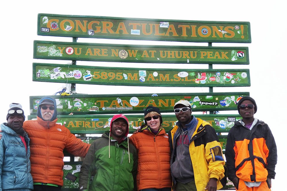 Dan and Vicki N. with their porters and guides at the peak
