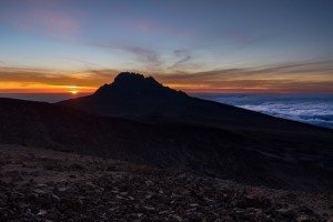 A jagged peak of Kilimanjaro at sunset
