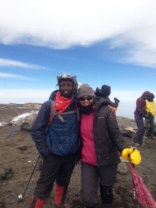 Leah H. and a guide pose on Kilimanjaro