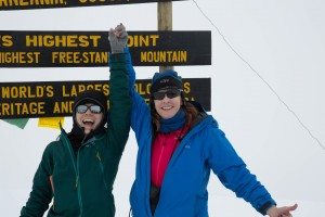 Laurel W. and a friend celebrate summiting Kilimanjaro