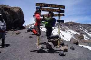 Natalie H. and a friend celebrate at Uhuru peak