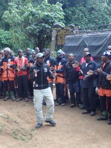 Porters welcoming trekkers with song and clapping