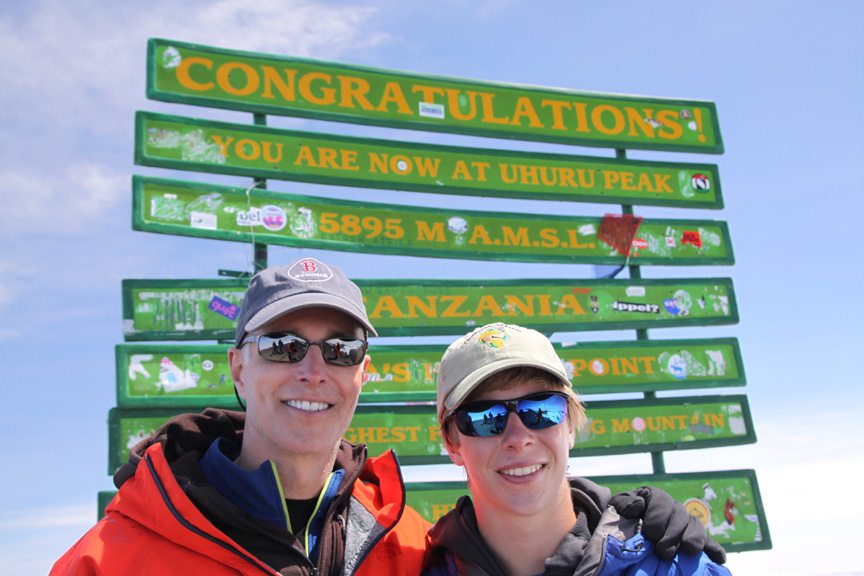 Tom R. and his son at Uhuru peak.