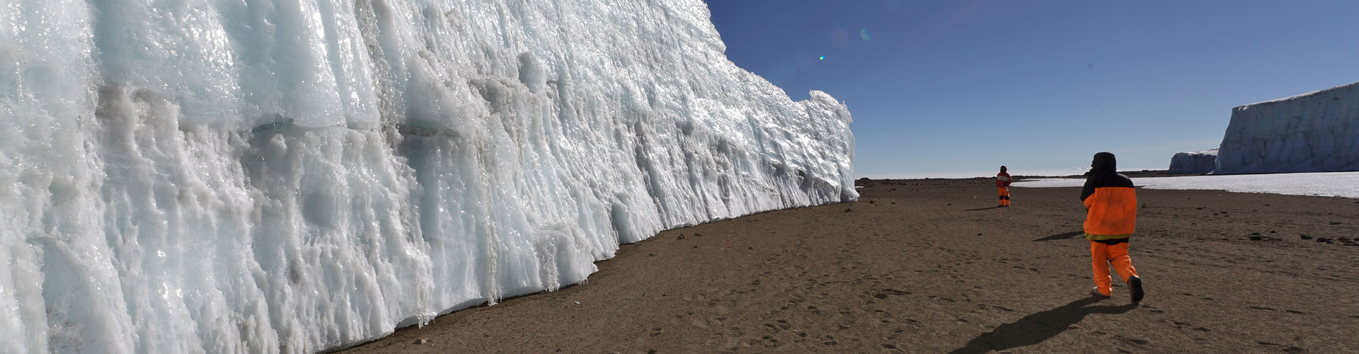 Porters with Kilimanjaro's glaciers