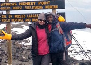Leah and a guide at Uhuru peak