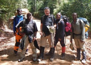 Dr. Joel Batzofin with guides and porters on the trail