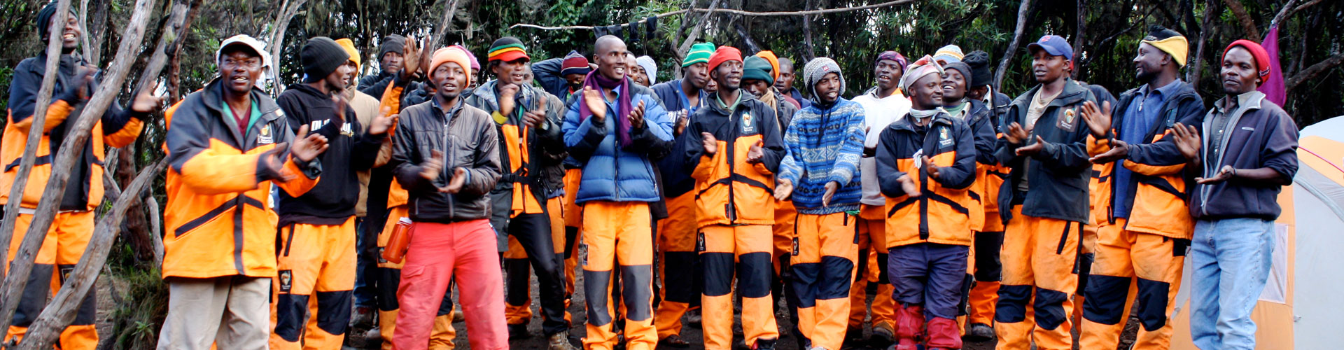 Porters singing a song to motivate trekkers