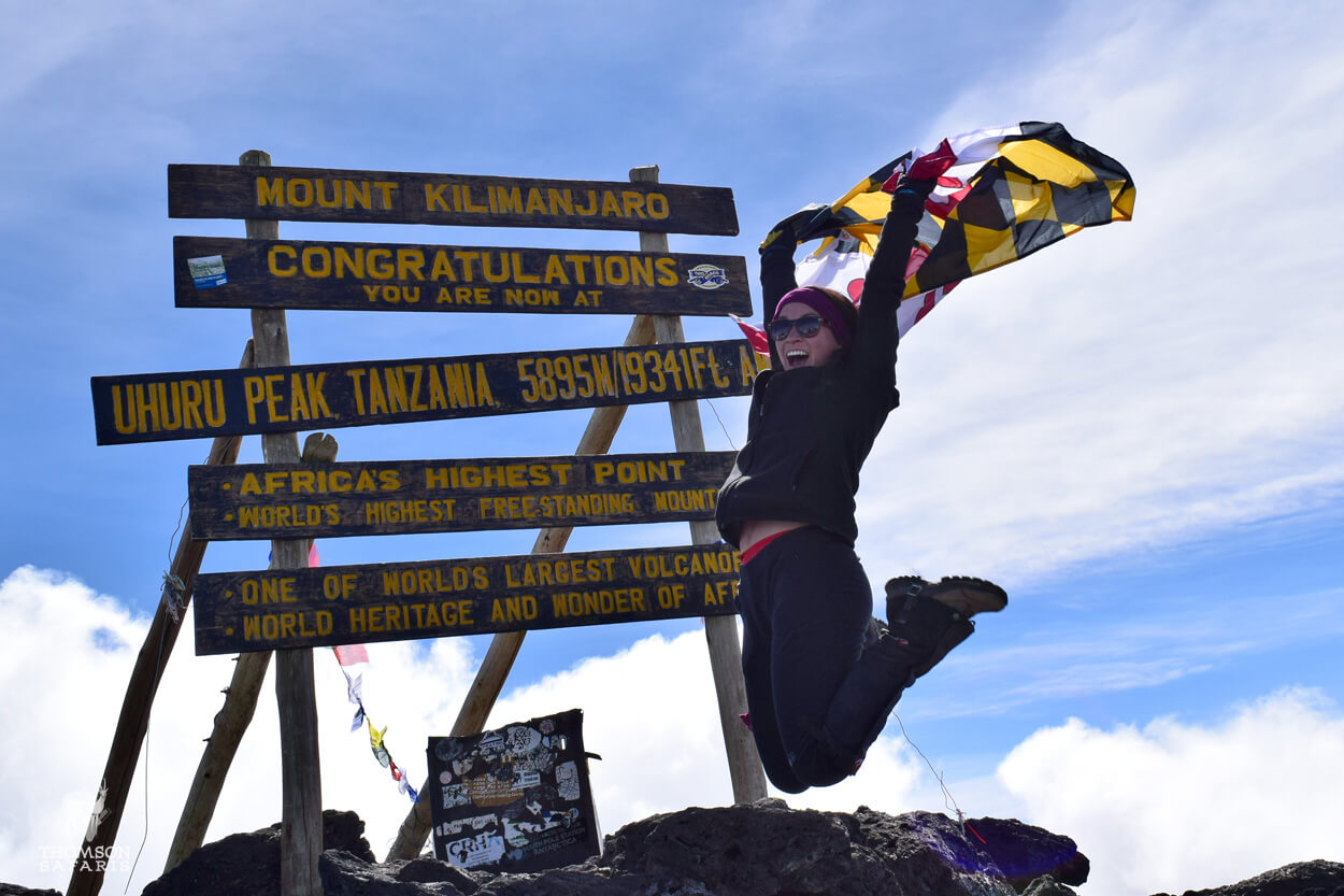 jumping at the kilimanjaro summit