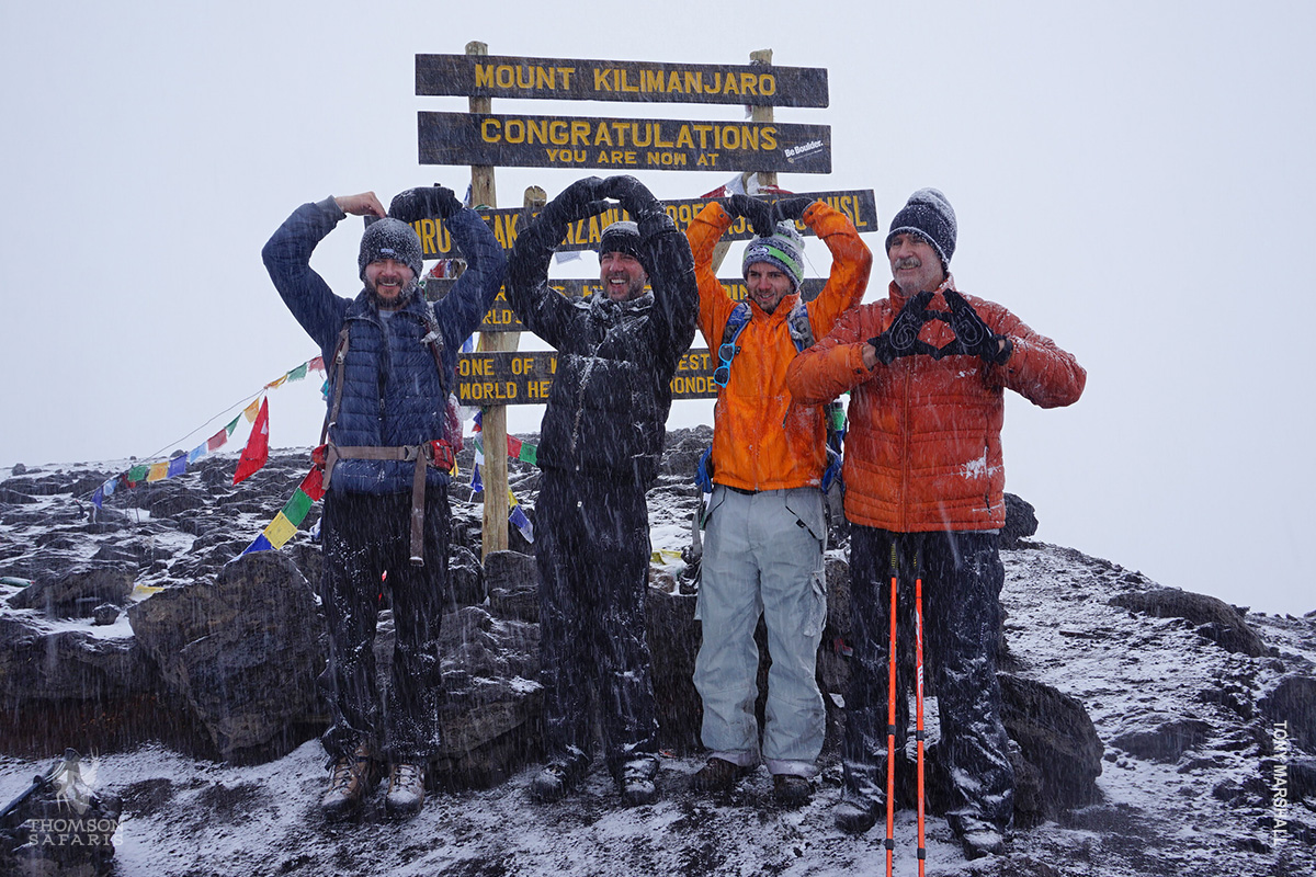 dad son and grandfather climb kilimanjaro