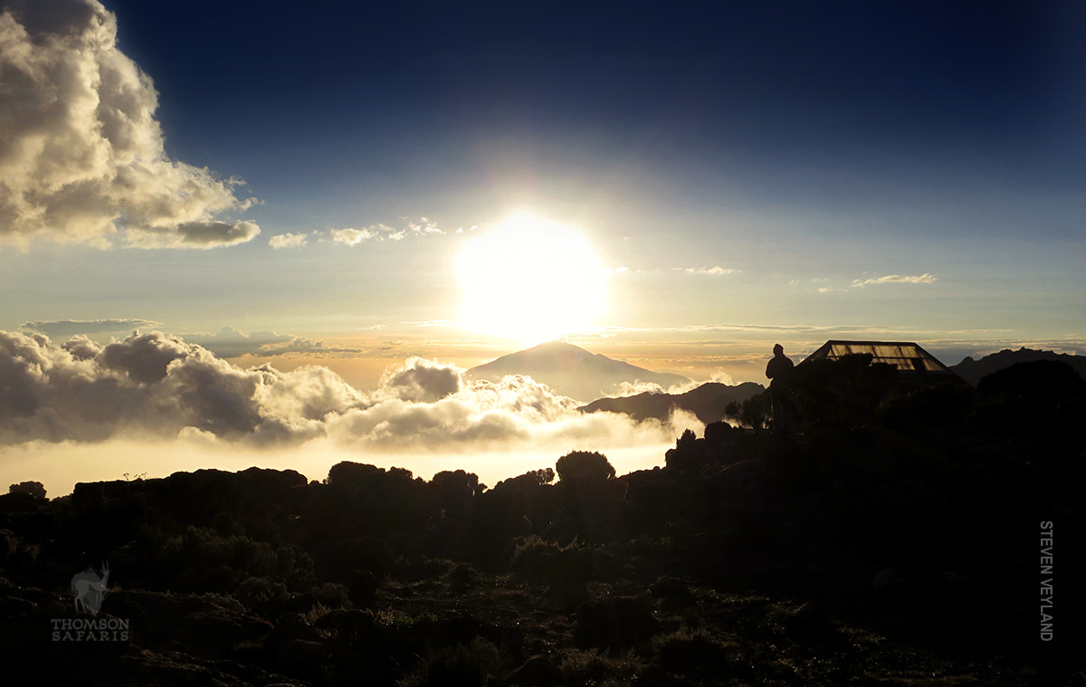 watch the sunset from camp on mount kilimanjaro