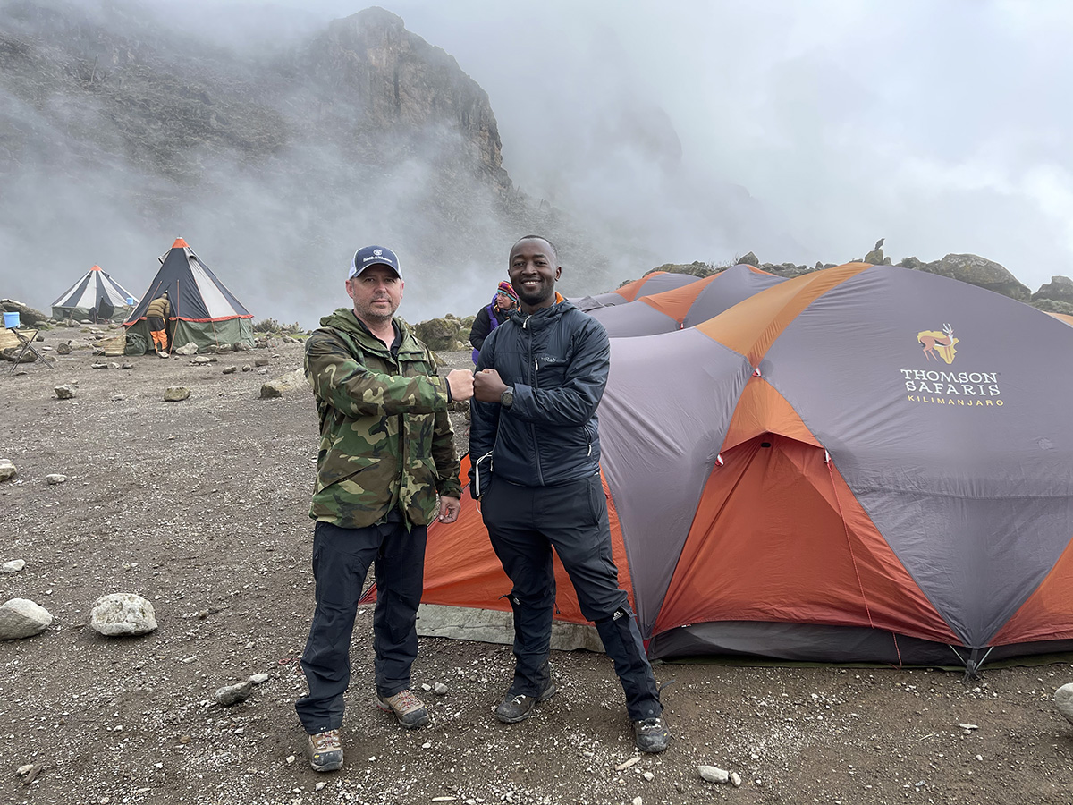 thomson guide polite and andy at kili camp