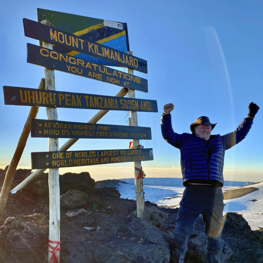 organ recipient at the summit of mount kilimanjaro