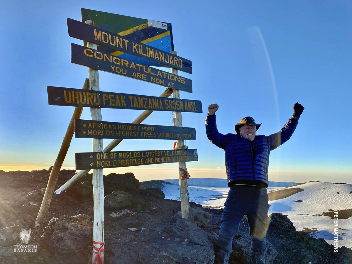 organ recipient at the summit of mount kilimanjaro