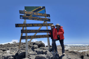 lisa and joe at the summit of kilimanjaro