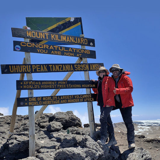 lisa and joe at the summit of kilimanjaro