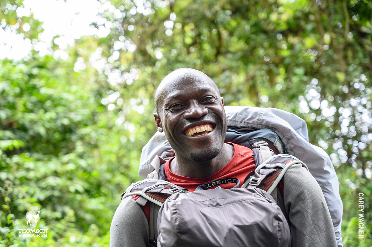 smiling porter on kilimanjaro