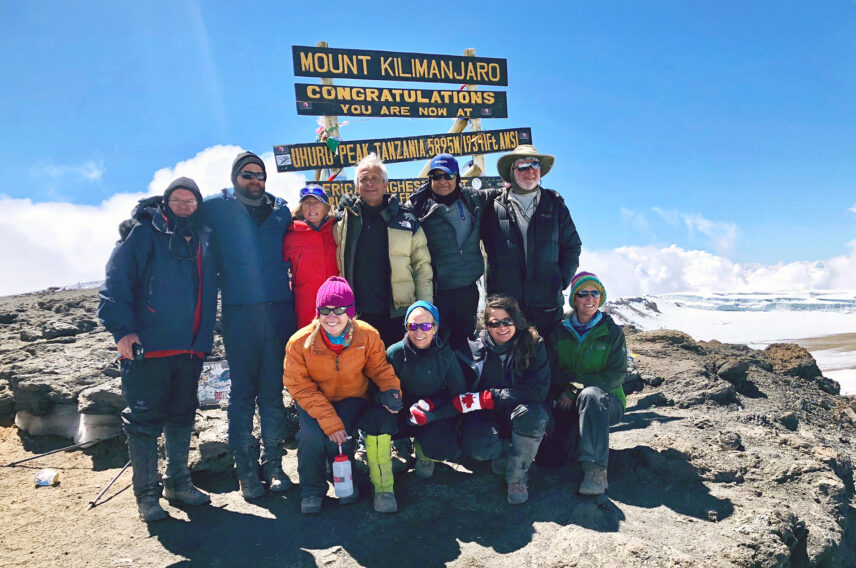 trekker at summit of kilimanjaro