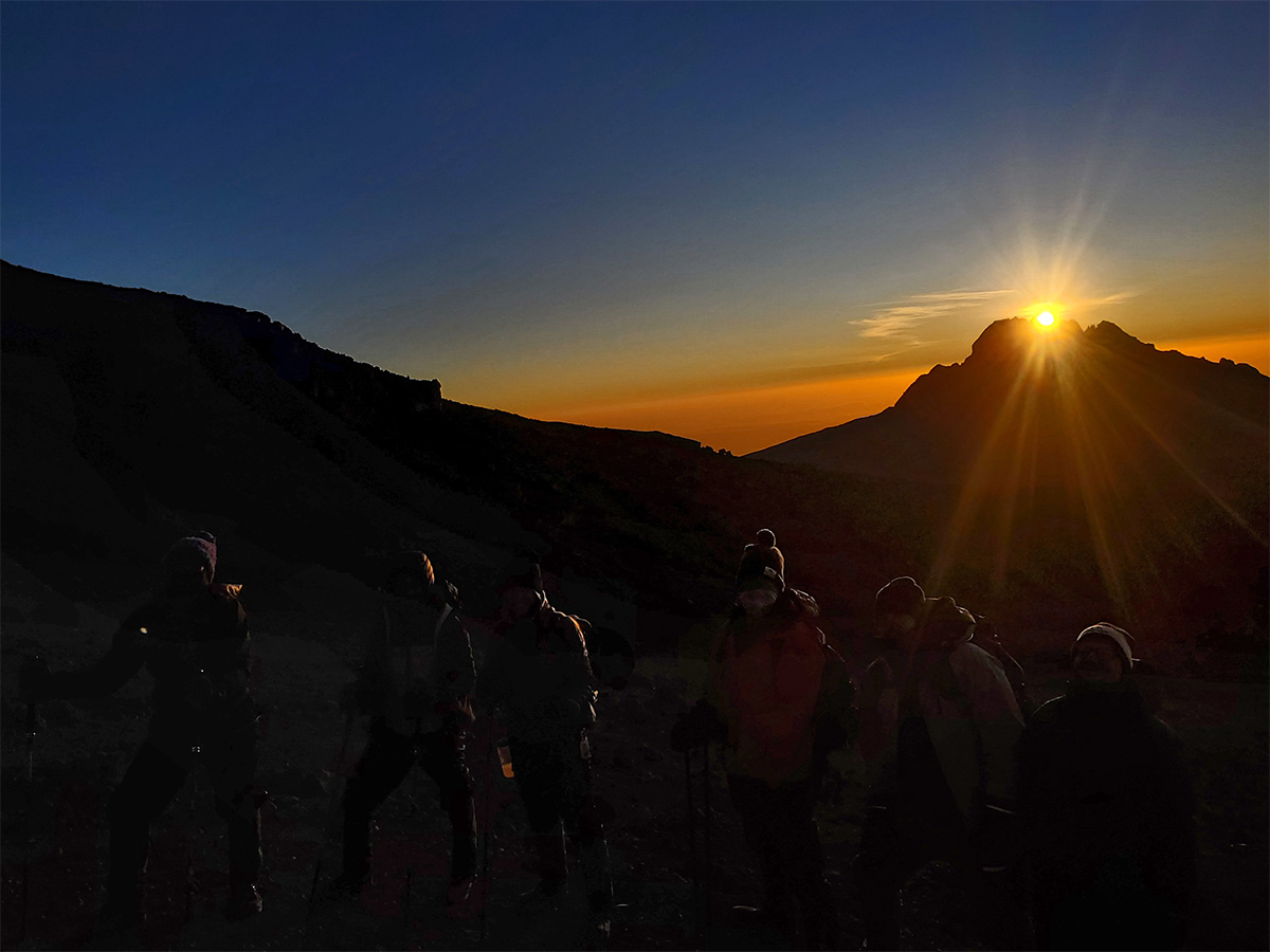 sun rises over mawenzi peak on kilimanjaro