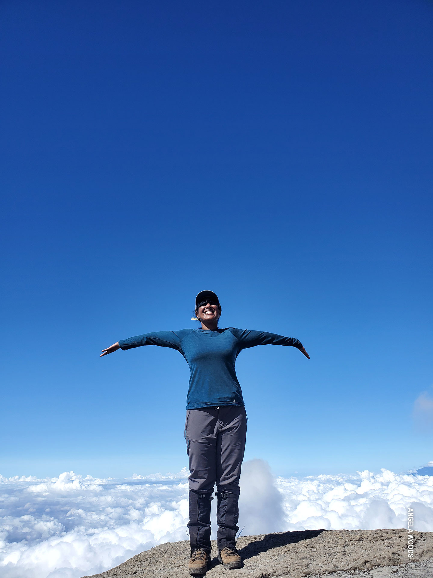 angela trekking above cloud line in alpine desert zone