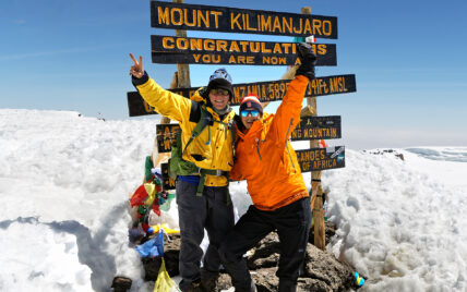couple celebrates at kilimanjaro summit