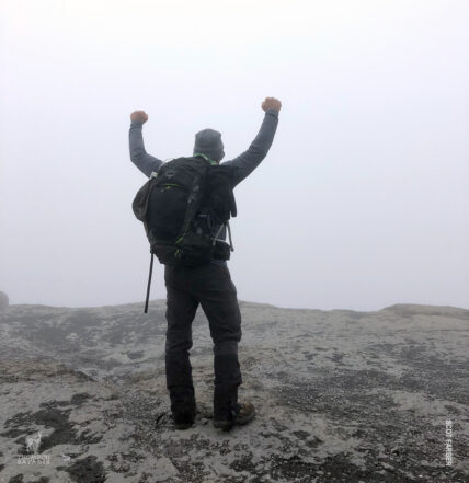 Scot Farber celebrating his victory after summiting for make-a-wish foundation
