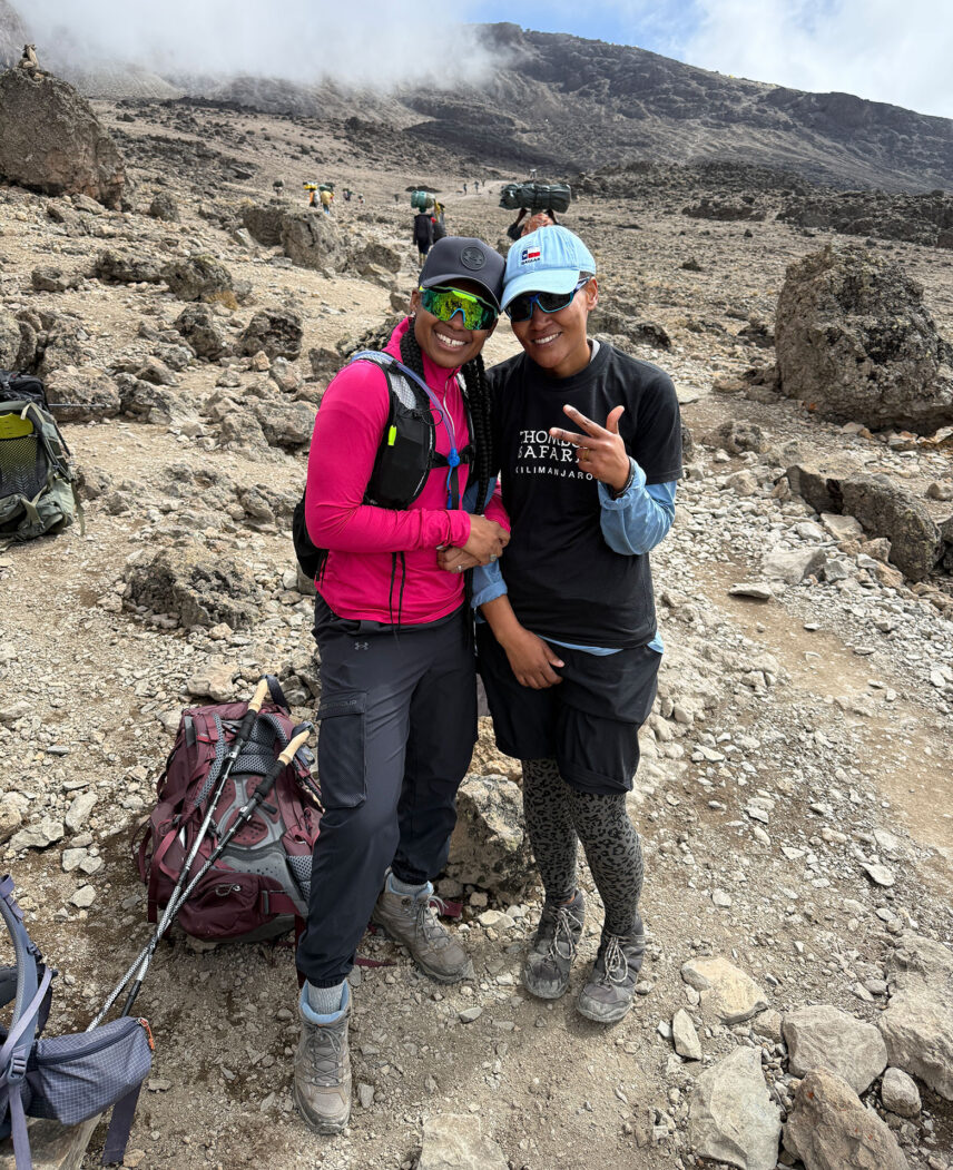 ari with female porter aggie on kilimanjaro
