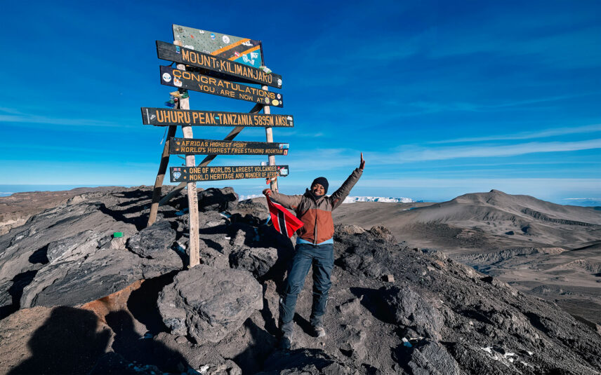 ariel belgrave at the summit of mount kilimanjaro