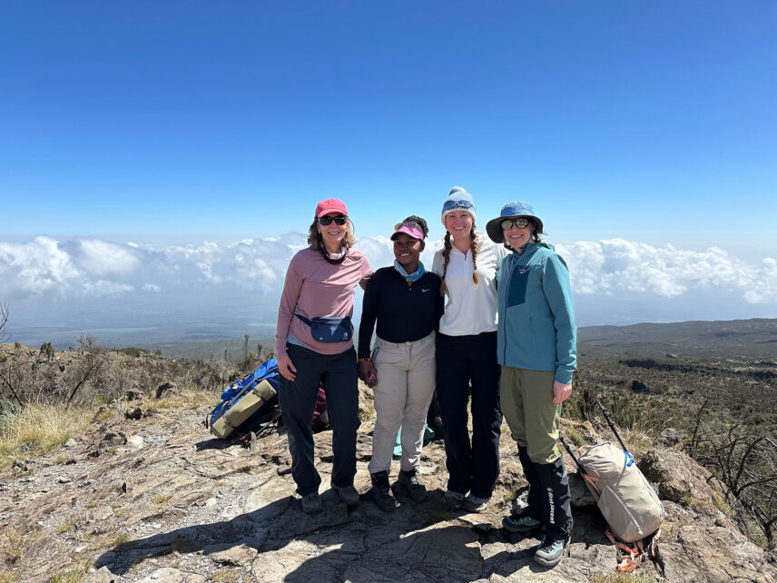 thomson trekkers with their female porter on kilimanjaro