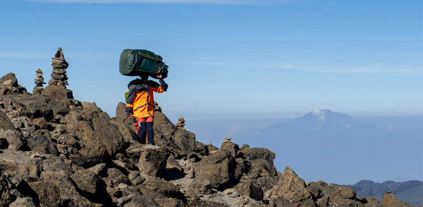 kilimanjaro porter with bag on head